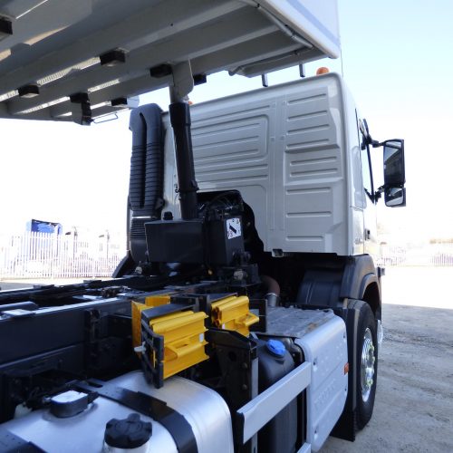 Volvo FM410 8x4 Tridem Bulk Tipper Side View of Truck Bed with Trailer Raised