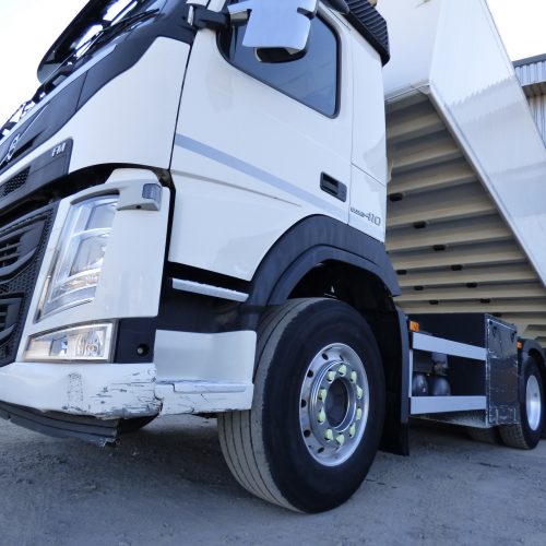 Volvo FM410 8x4 Tridem Bulk Tipper Side View with Trailer Raised