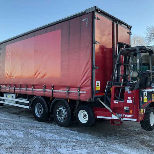 red daf lorry exterior rear left with forklift