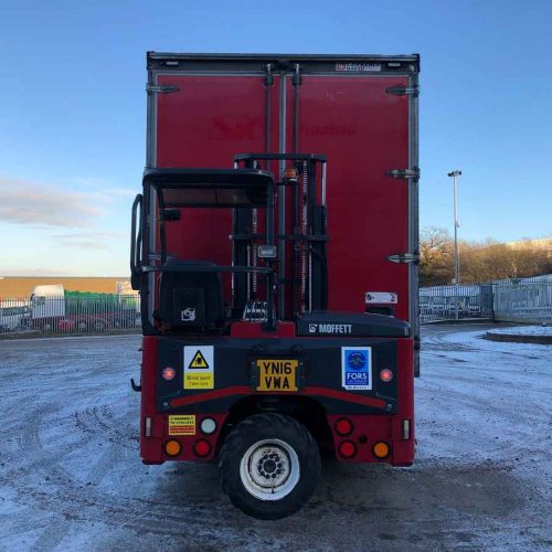 red daf lorry exterior rear view with forklift